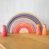 Neonfreunde Pink von Grimms vor Regenbogen Neonpink