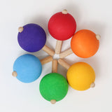 6 Regenbogen Kreisel von Grimm's in Kreis gelegt