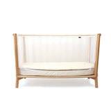 Seitenansicht von geöffnetem Babybett KIMI von Charlie Crane in Bois de Rose Farbton