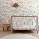 In Kinderzimmer stehendes Babybett KIMI von Charlie Crane mit moosgrünen Schnüren
