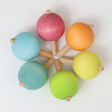 6 Pastell Kreisel von Grimm's in Kreis liegend