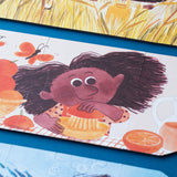 Londji Puzzle My Colours – Detail des orangefarbenen Wendepuzzles mit illustrierter Szene