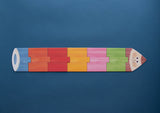 Londji Puzzle My Colours – drei stiftförmige Verpackungen in Rot, Gelb und Blau